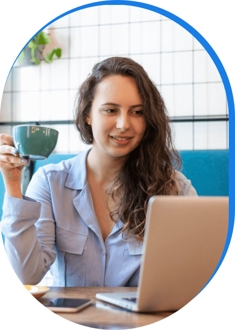 a young woman having a coffee while looking at her laptop the SEO growth metrics of her business